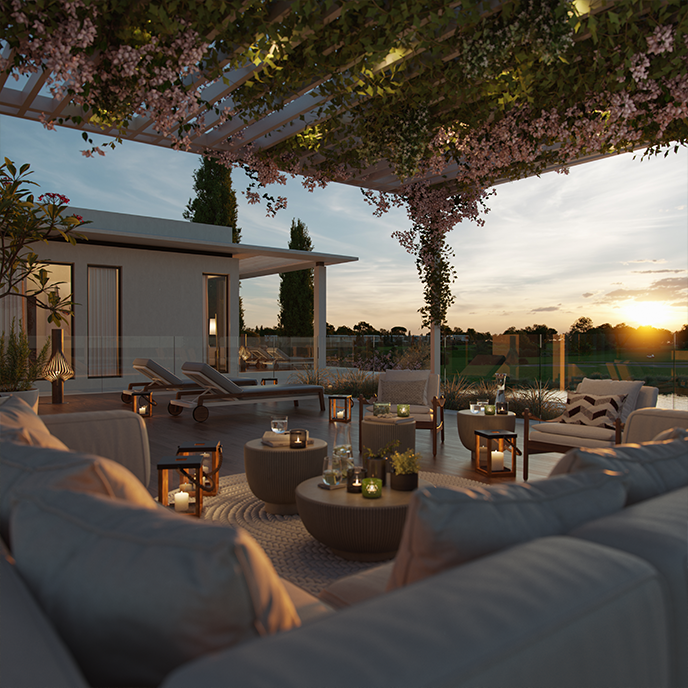 An elegant terrace overlooking a golf course at dusk, decorated with a variety of outdoor furniture and lanterns.